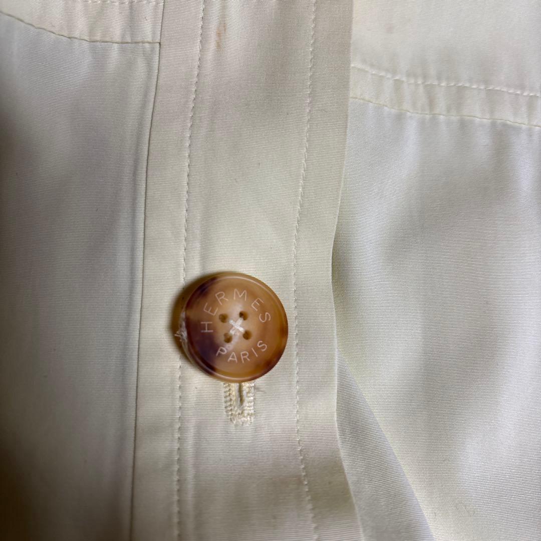 エルメス淡い黄色のトレンチコート