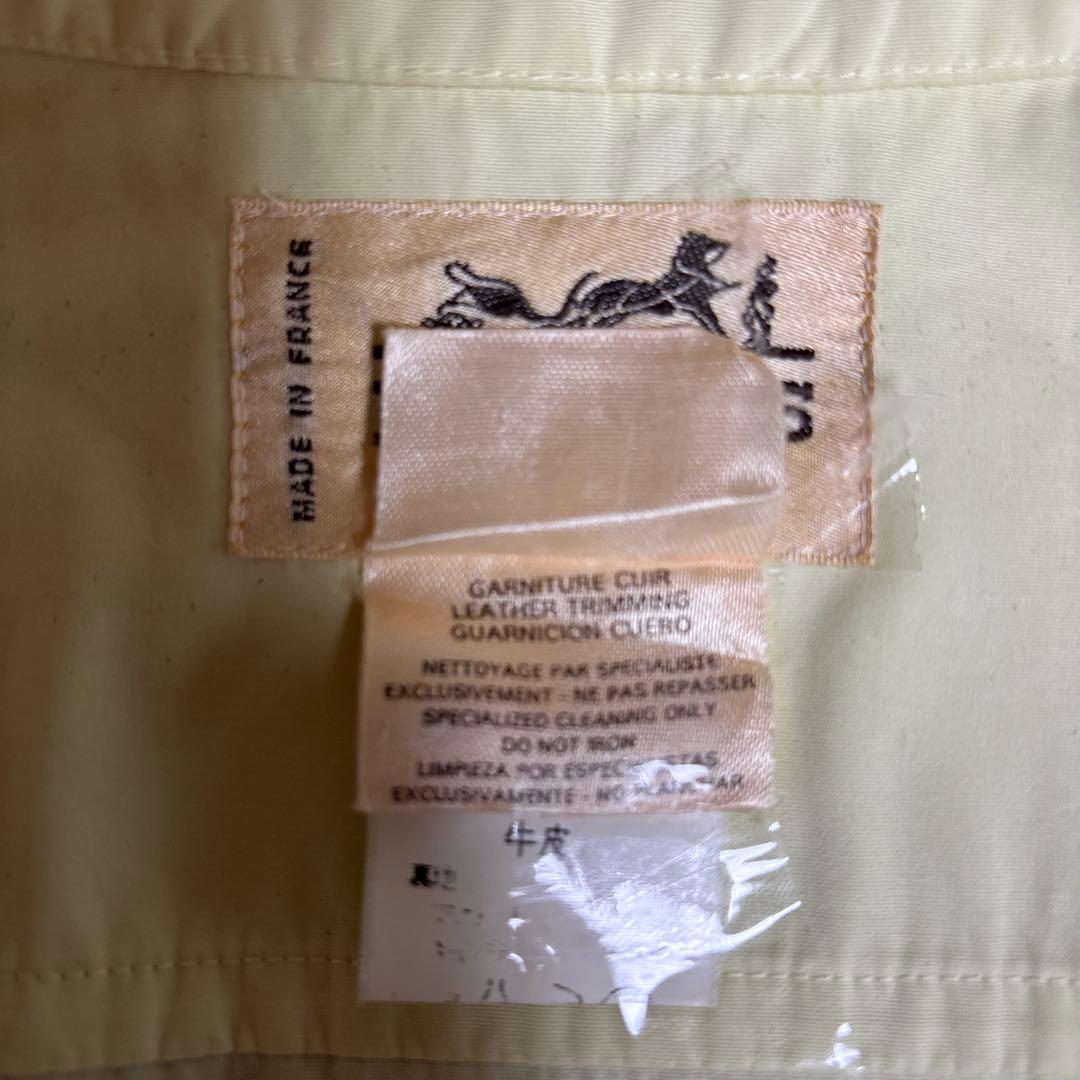 エルメス淡い黄色のトレンチコート