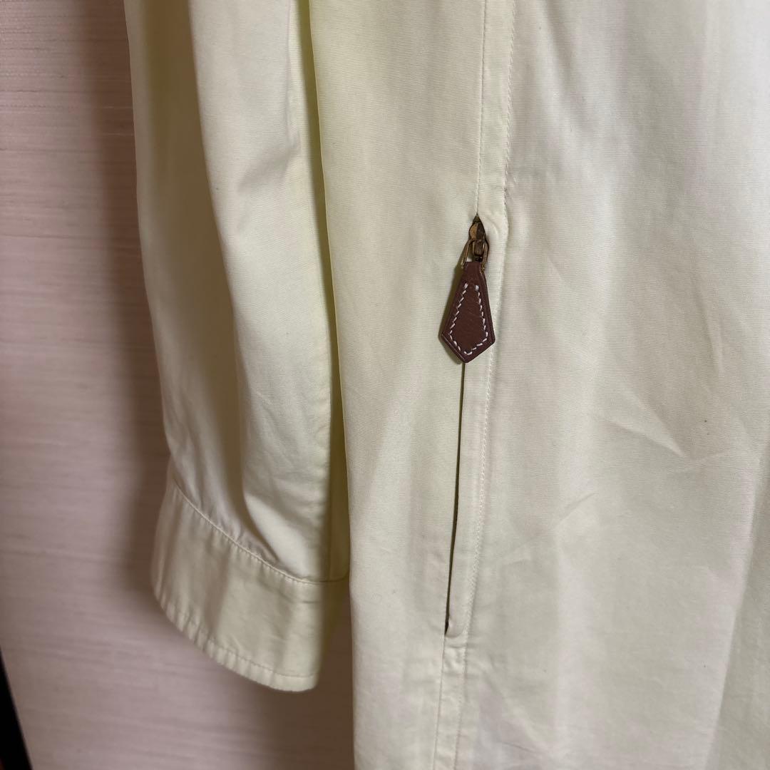 エルメス淡い黄色のトレンチコート