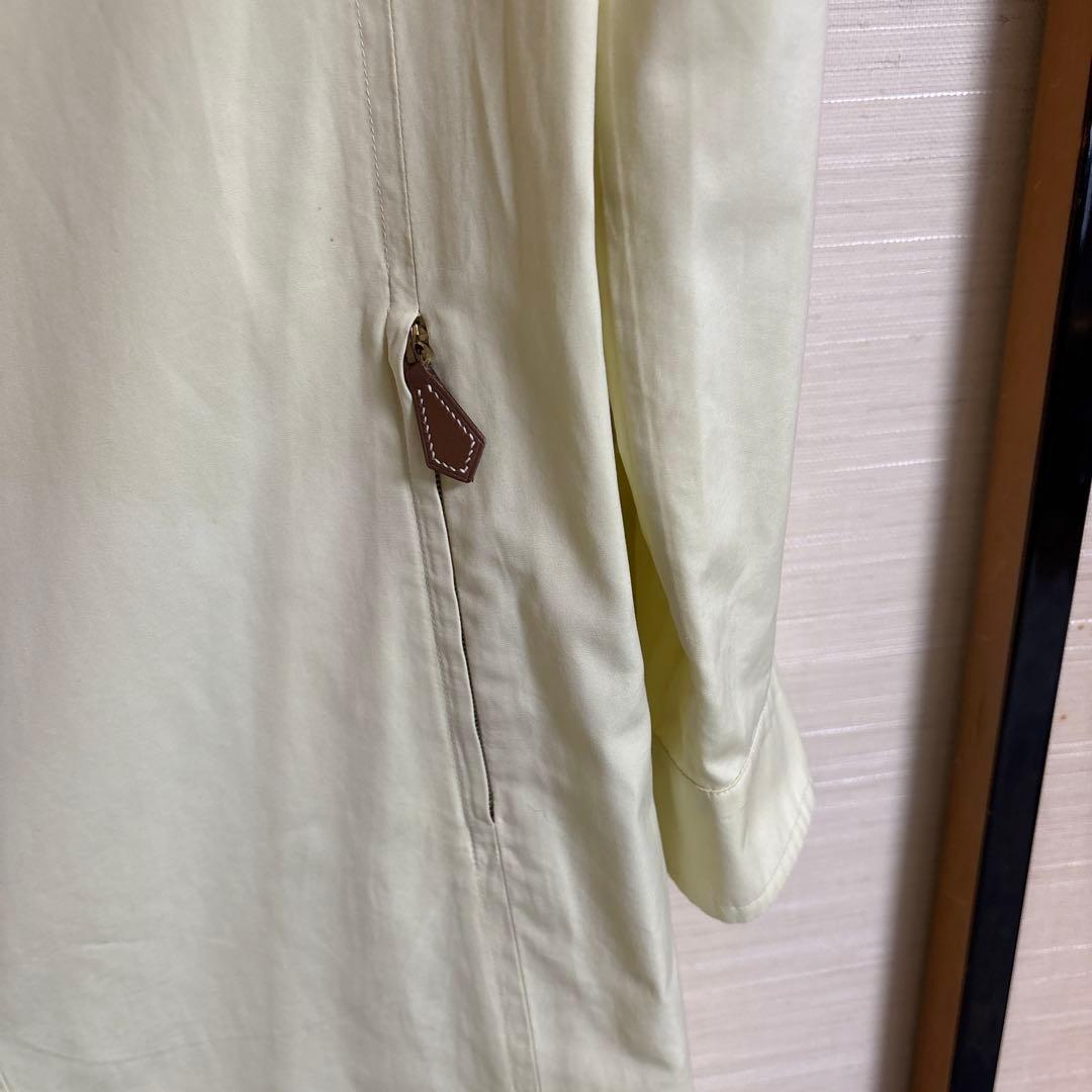 エルメス淡い黄色のトレンチコート