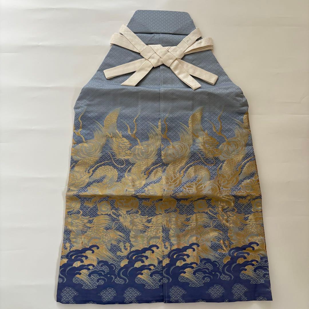 (7-138)馬乗袴　2尺1寸　水色　龍柄　金