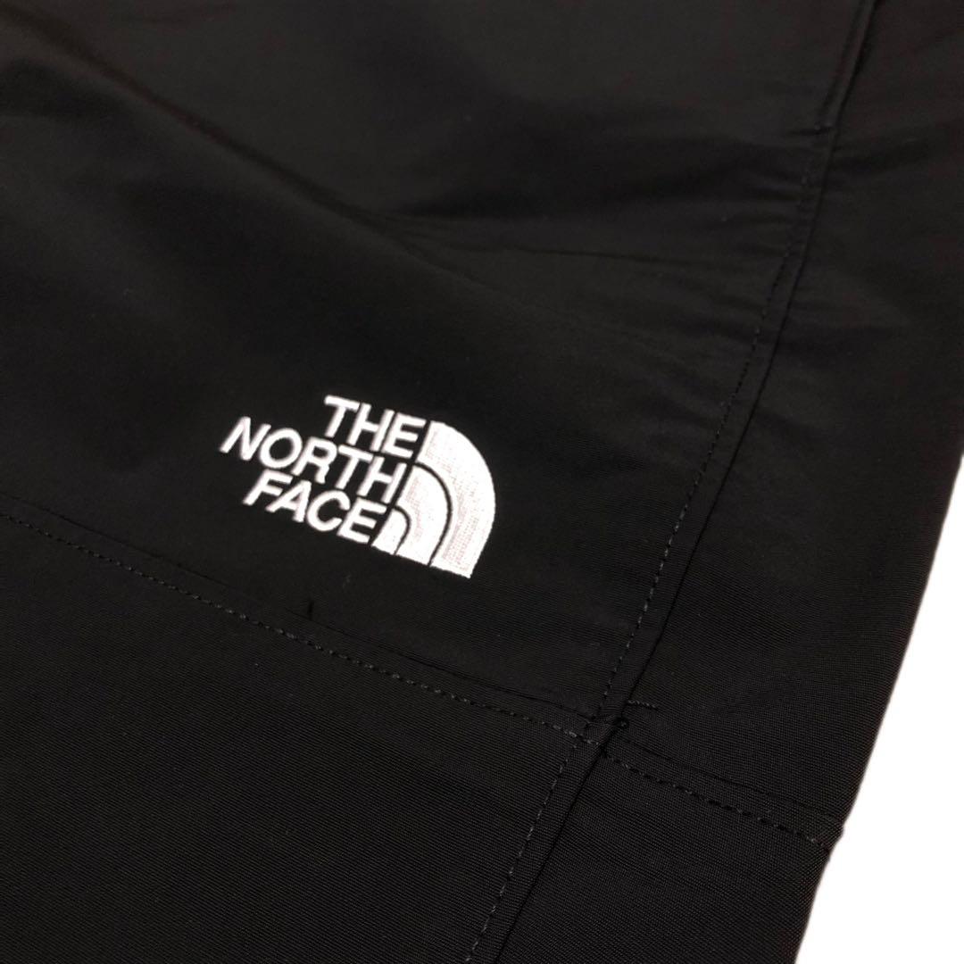 【海外限定】ノースフェイス　ウインドパンツ　刺繍　日本XXL相当　A520