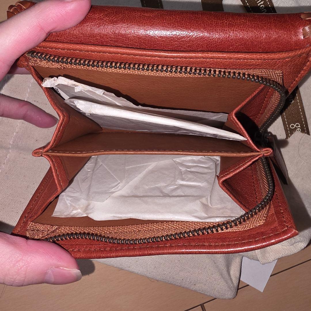 《新品未使用》genten ゲンテン オレンジ レザー 二つ折り財布 羊革