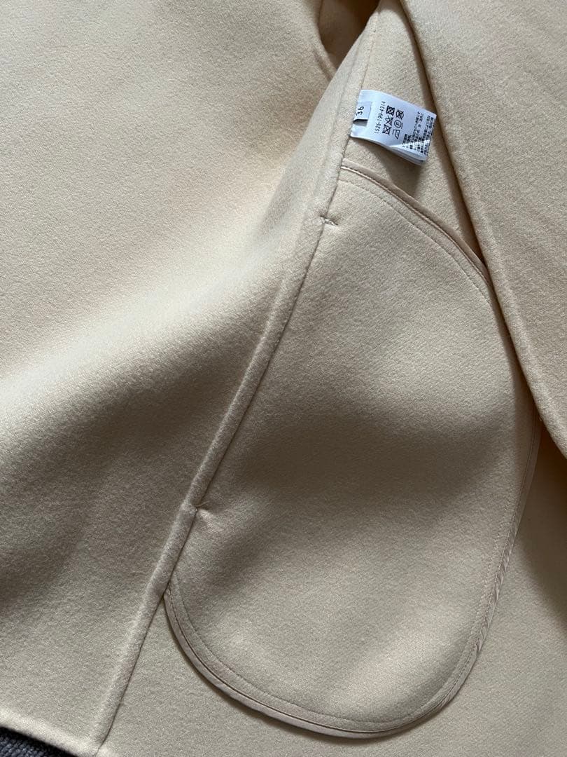 クリーム色 ノーカラージャケット