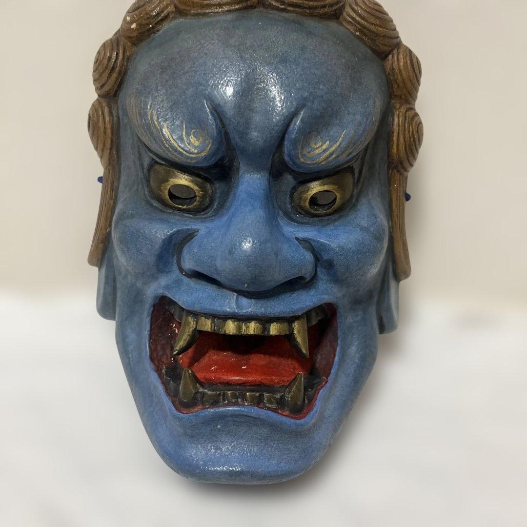 青い鬼の木製能面