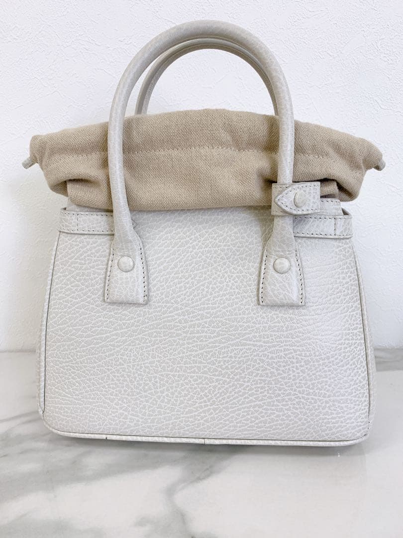 ＋メゾンマルジェラ ドローストリングバッグ 5AC SB3WD0005