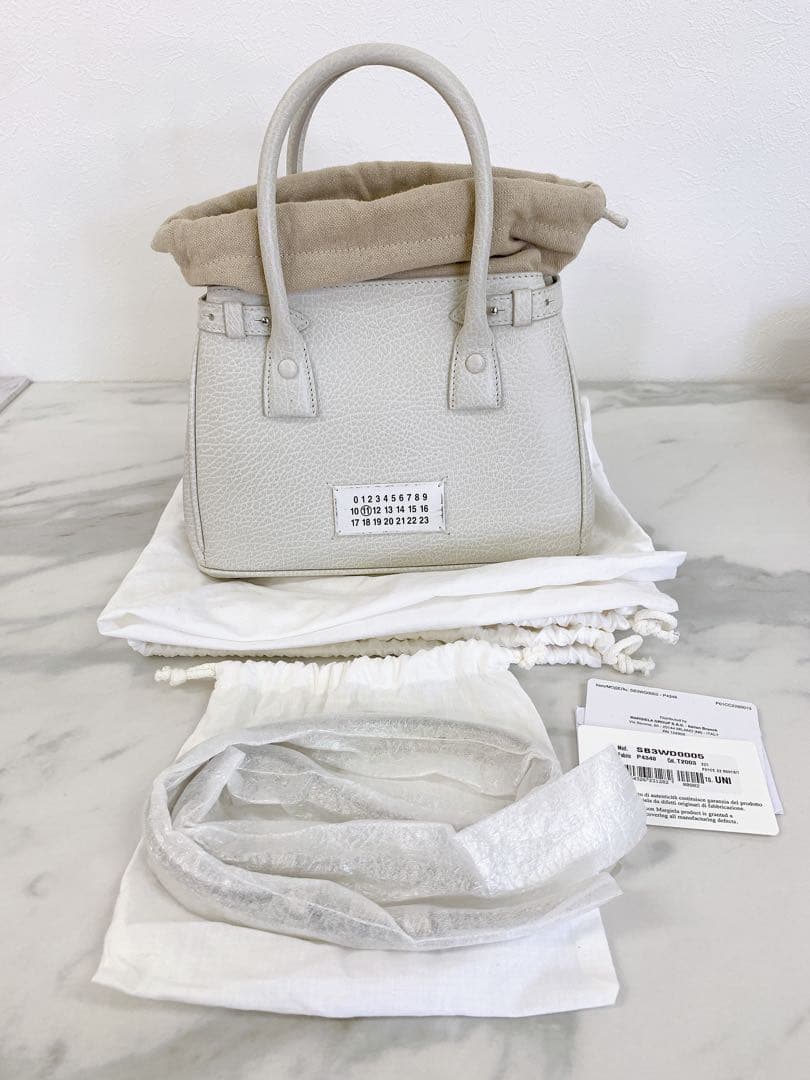 ＋メゾンマルジェラ ドローストリングバッグ 5AC SB3WD0005