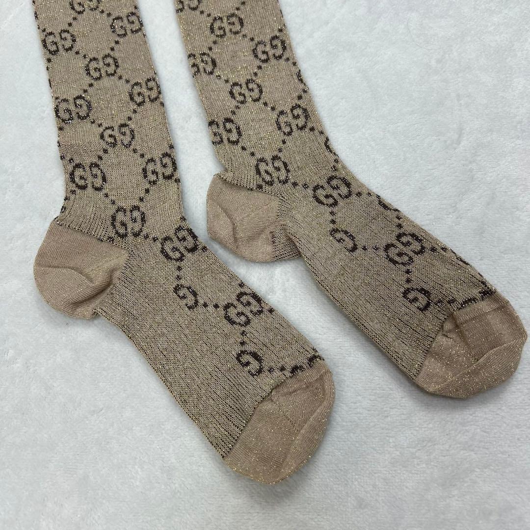 H627 新品未使用 23cm グッチ GGロゴ ラメ ハイソックス レディース