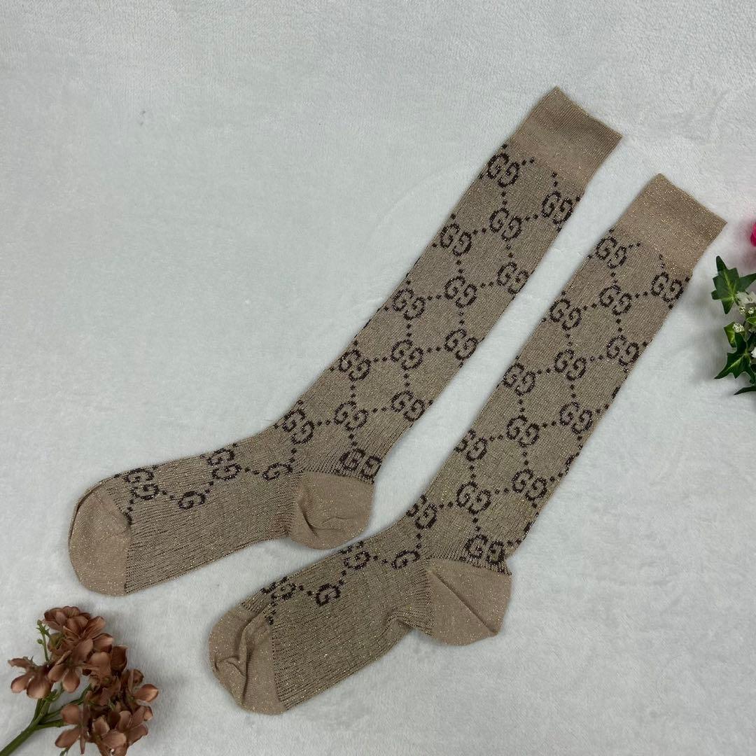 H627 新品未使用 23cm グッチ GGロゴ ラメ ハイソックス レディース