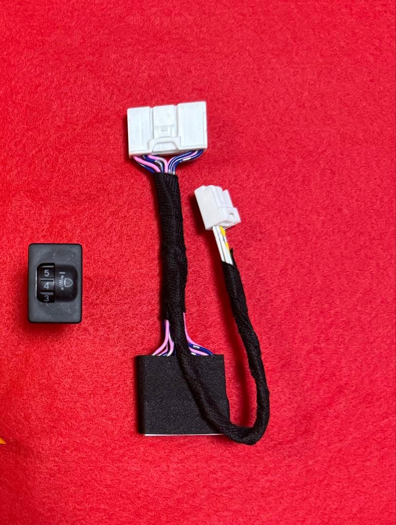 ハイラックス　ヘッドライト　レベライザー