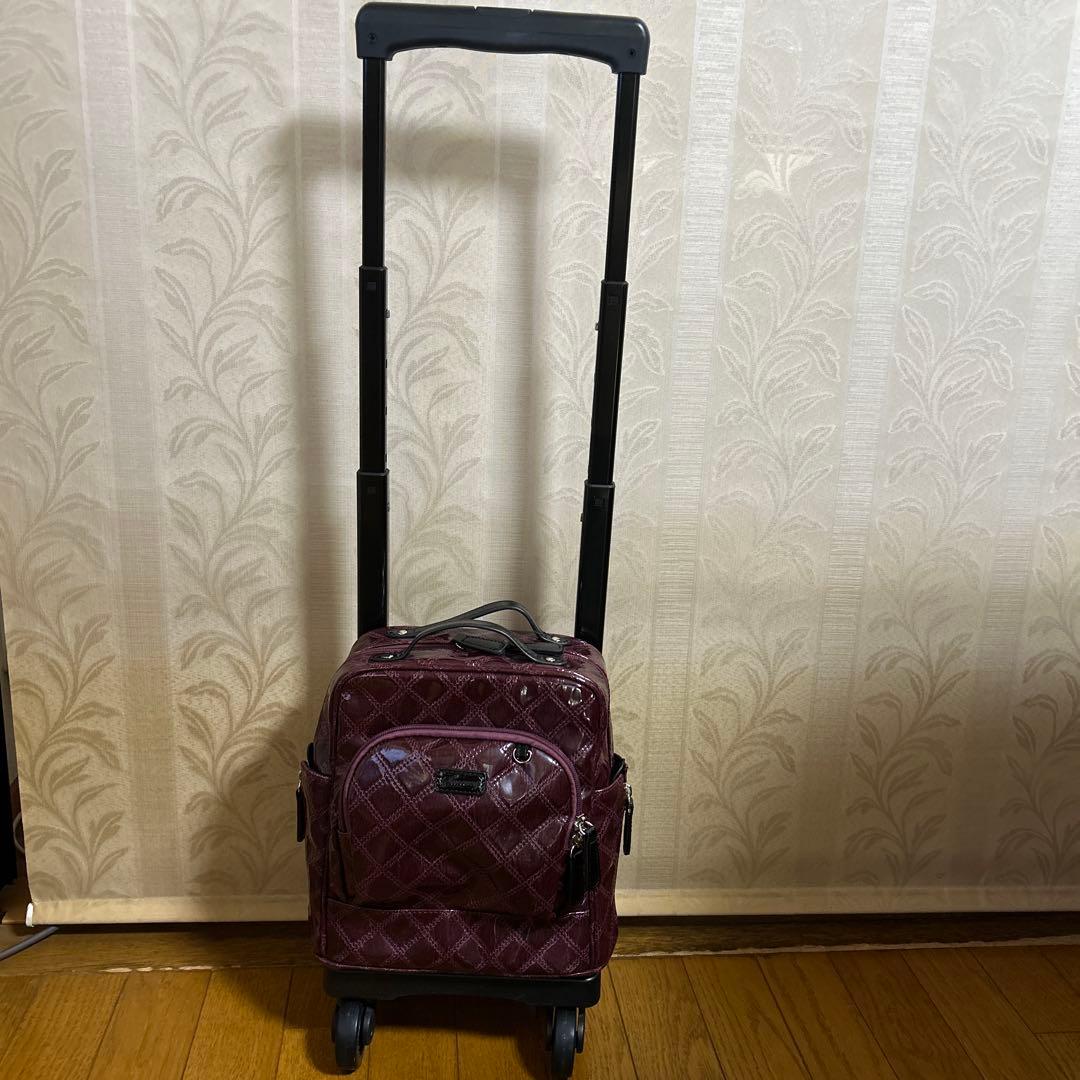 スワニー バーガンディ キルティングバッグとキャリーケース
