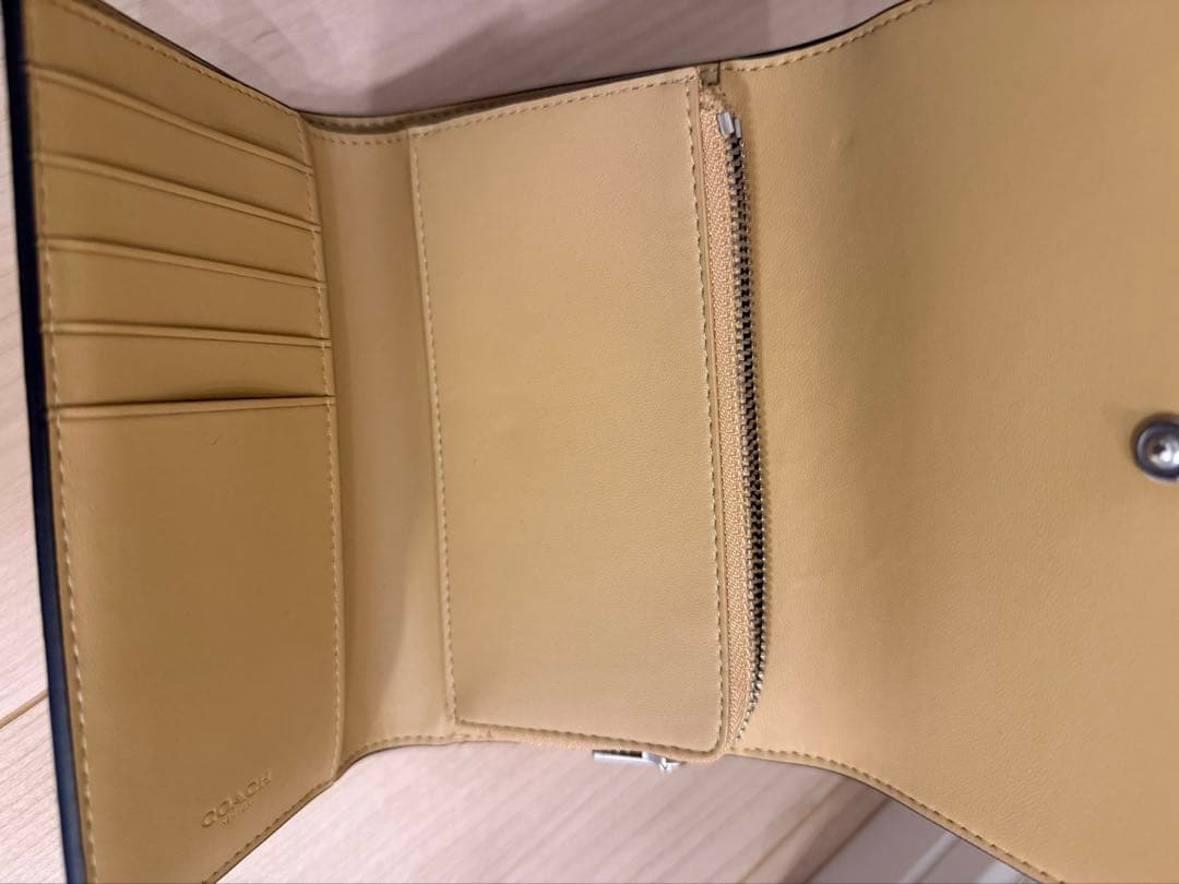 COACHコーチ三つ折り財布イエロー黄色ウォレット