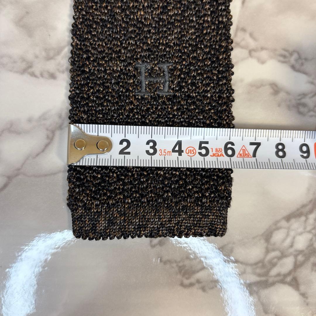 HERMES ニットタイ　ブラウン　ブラック　茶　黒　ワンポイント