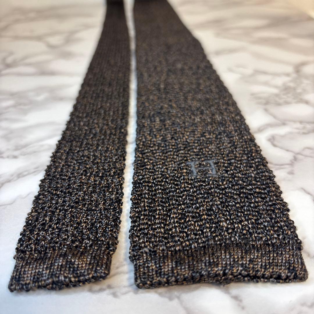 HERMES ニットタイ　ブラウン　ブラック　茶　黒　ワンポイント