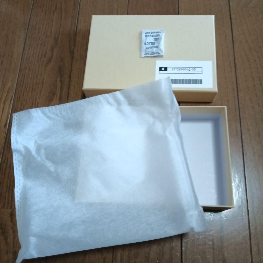 ディノスの牛革ミドルウォレット シャンパンゴールド