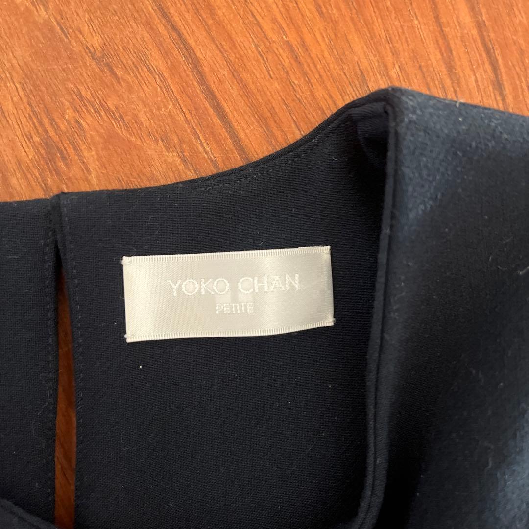 紺色のAラインワンピース 長袖 バックパール装飾付き130〜140