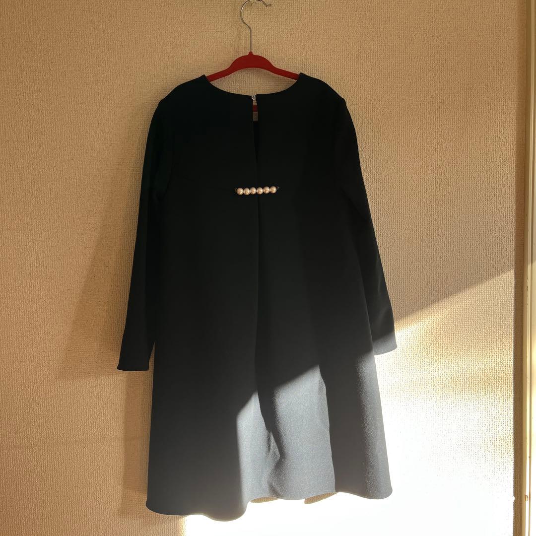 紺色のAラインワンピース 長袖 バックパール装飾付き130〜140