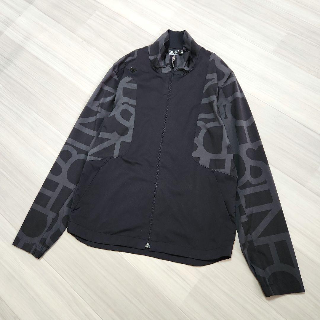 DESCENTE GOLFタイポグラフィモチーフウィンドジャケットストレッチM黒