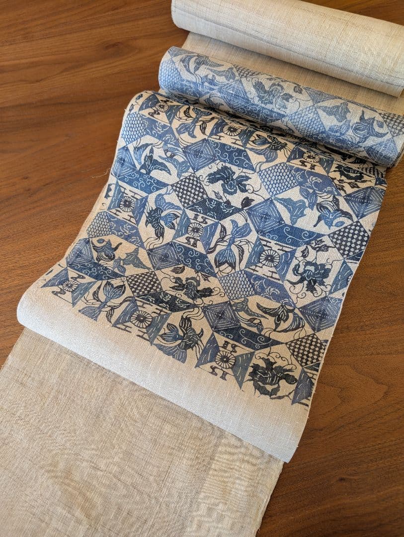 新品未使用　名古屋帯　帯反物　藍　古琉球更紗　生紬と記載　未仕立て