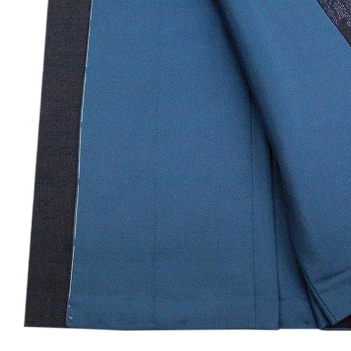 【重要無形文化財　本場結城紬】 ～百亀甲絣～　お洒落な雪輪文　新品のお着物です