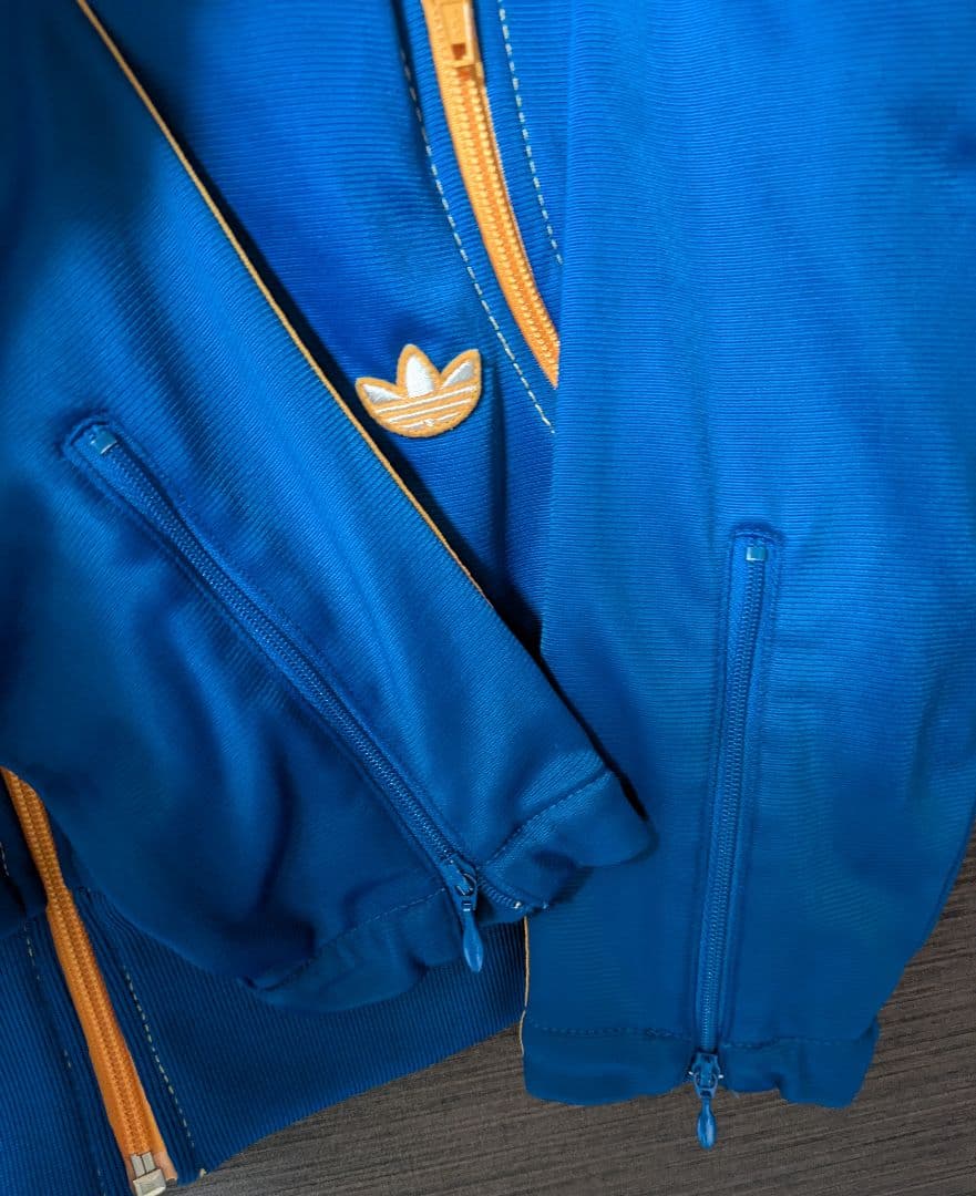 希少 adidas70s 復刻トラックジャケット青 /黄　万国旗　曲がりポケット