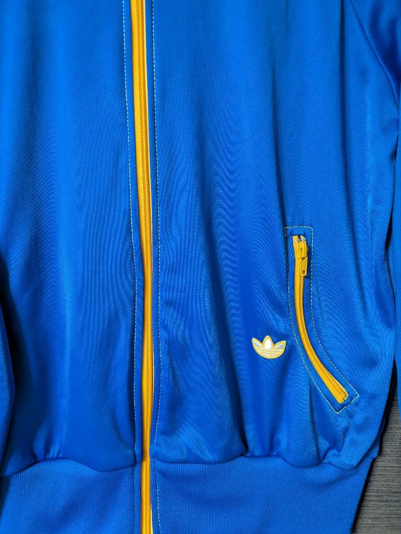 希少 adidas70s 復刻トラックジャケット青 /黄　万国旗　曲がりポケット