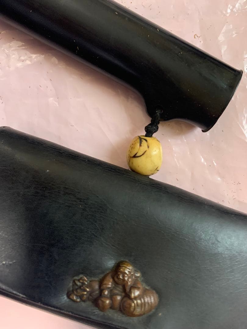 携帯用のキセル（煙管）ケースと煙草入れ　ダイコクさんの柄入