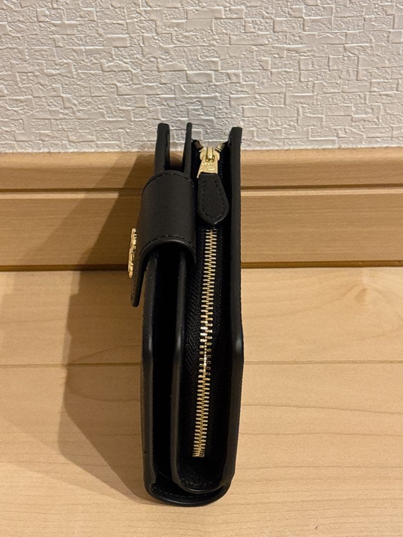 【人気商品】COACH ミディアムコーナージップウォレット・シグネチャー 茶色