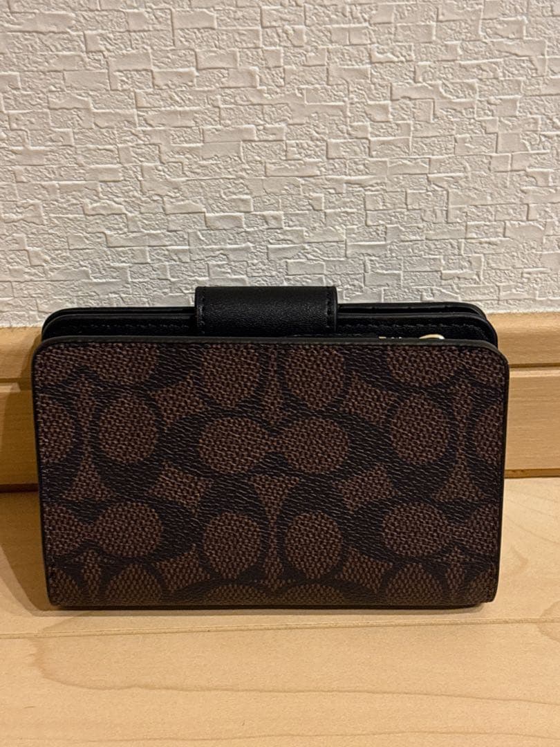 【人気商品】COACH ミディアムコーナージップウォレット・シグネチャー 茶色