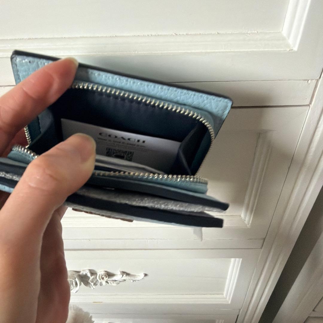 【新品未使用】COACH 二つ折り財布 ライトブルー