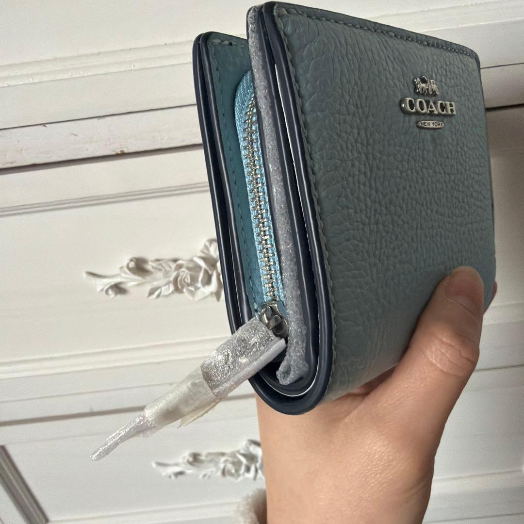 【新品未使用】COACH 二つ折り財布 ライトブルー
