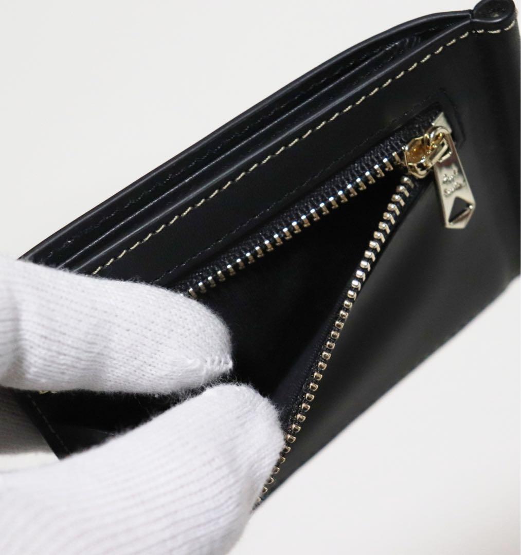 《ポールスミス》箱付新品 小銭入れ付 凹凸ロゴ レザー2つ折りマネークリップ