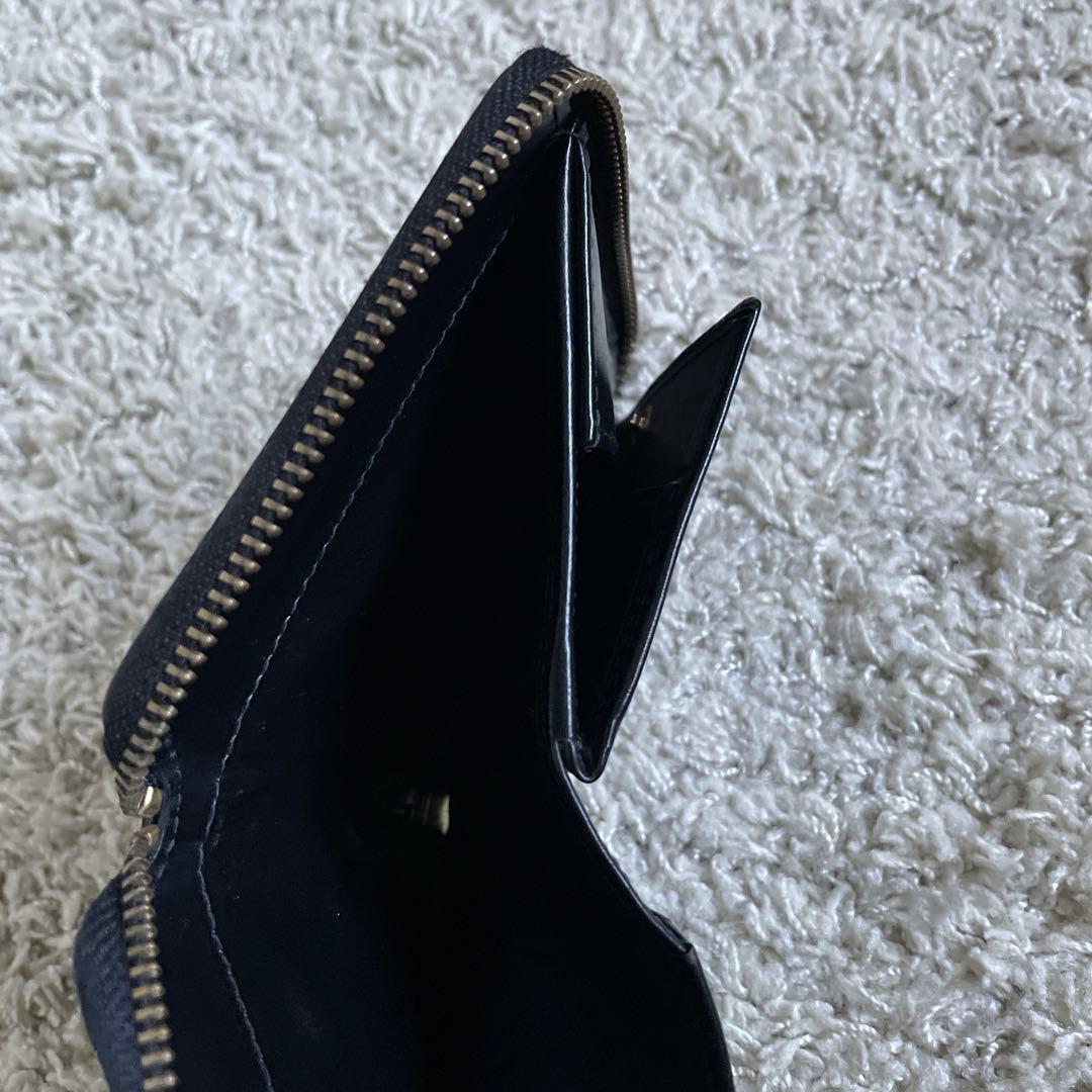 COMME des garçons ブラック二つ折り財布 ラウンドジップ