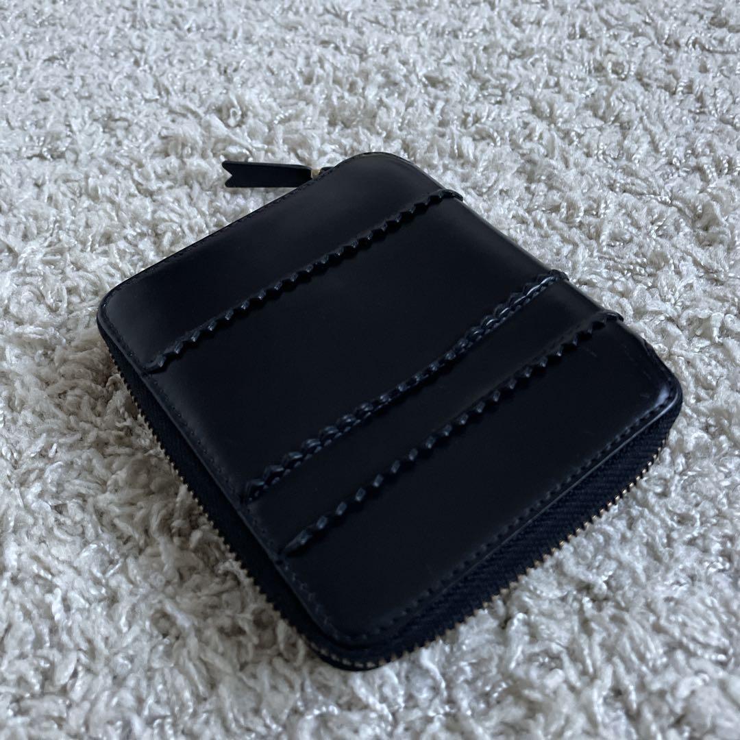 COMME des garçons ブラック二つ折り財布 ラウンドジップ