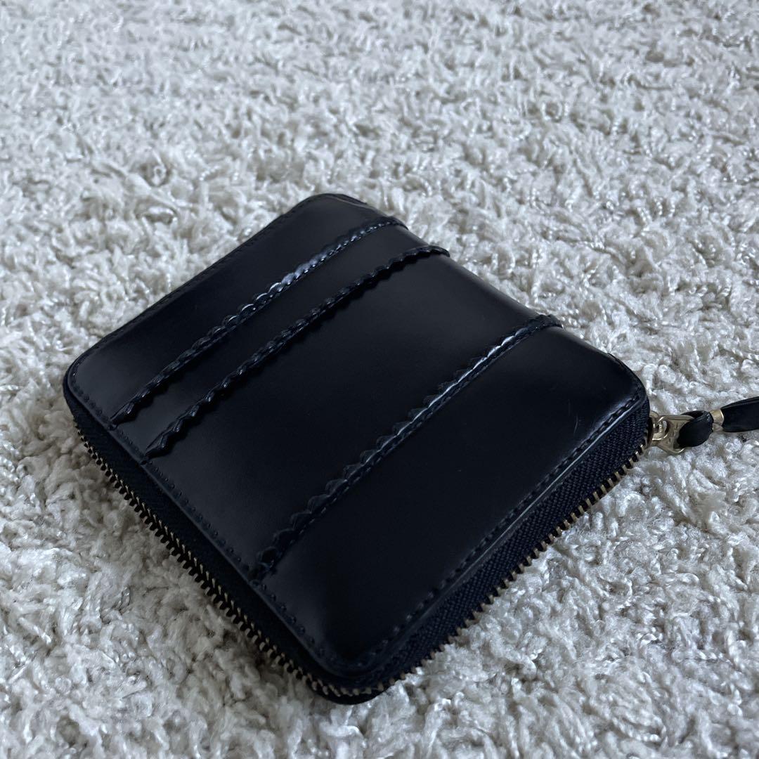 COMME des garçons ブラック二つ折り財布 ラウンドジップ