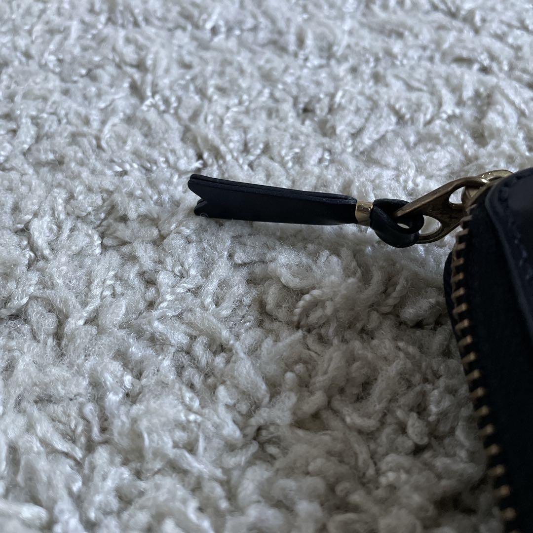 COMME des garçons ブラック二つ折り財布 ラウンドジップ