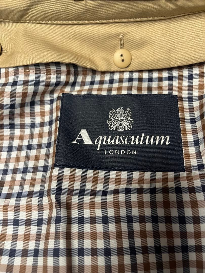 アクアスキュータムベージュ トレンチコート レディース