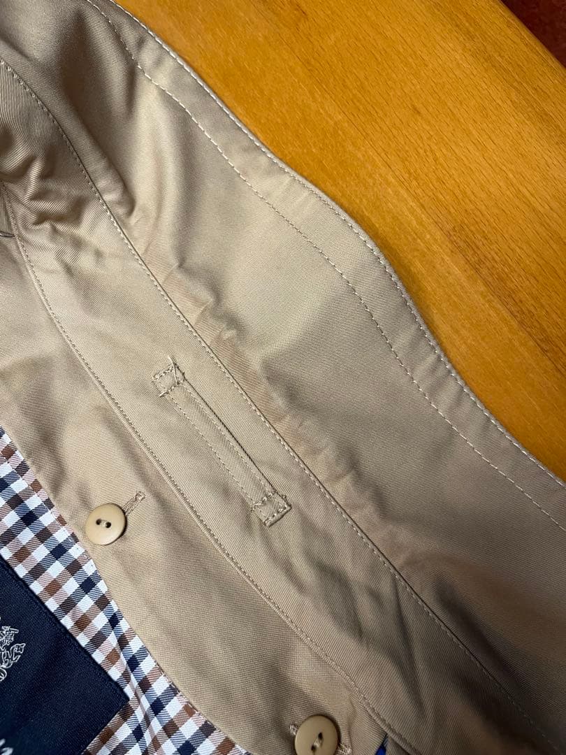 アクアスキュータムベージュ トレンチコート レディース