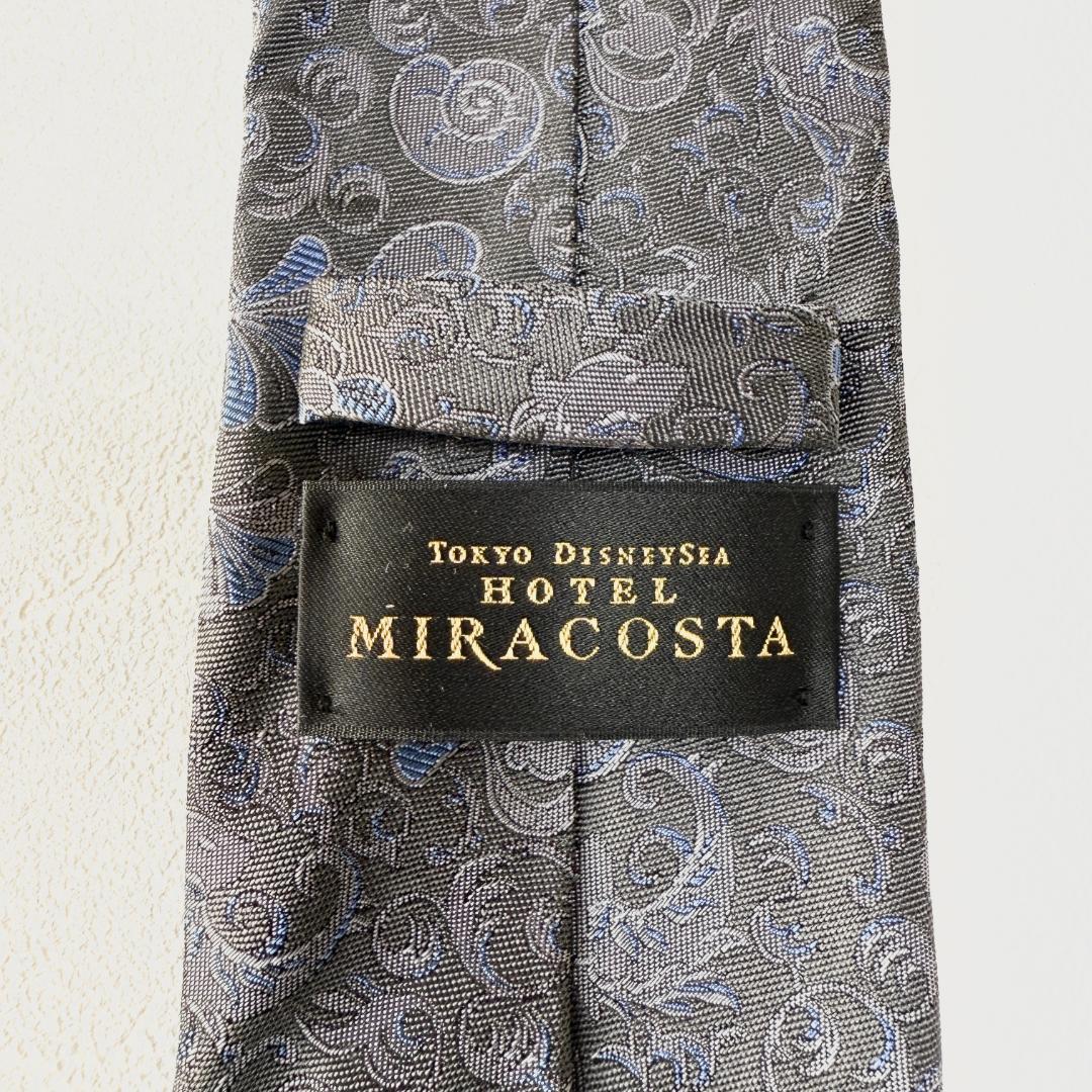 未使用級✨ホテルミラコスタ ネクタイ グレー ペイズリー風 ロゴ シルク 日本製