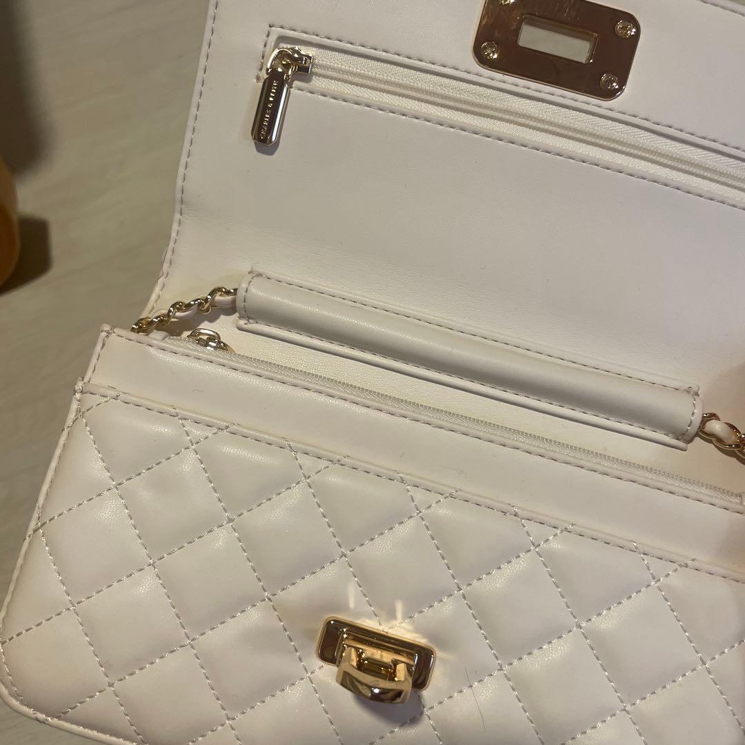 Cressida クレシダ キルトプッシュロッククラッチ - クリーム