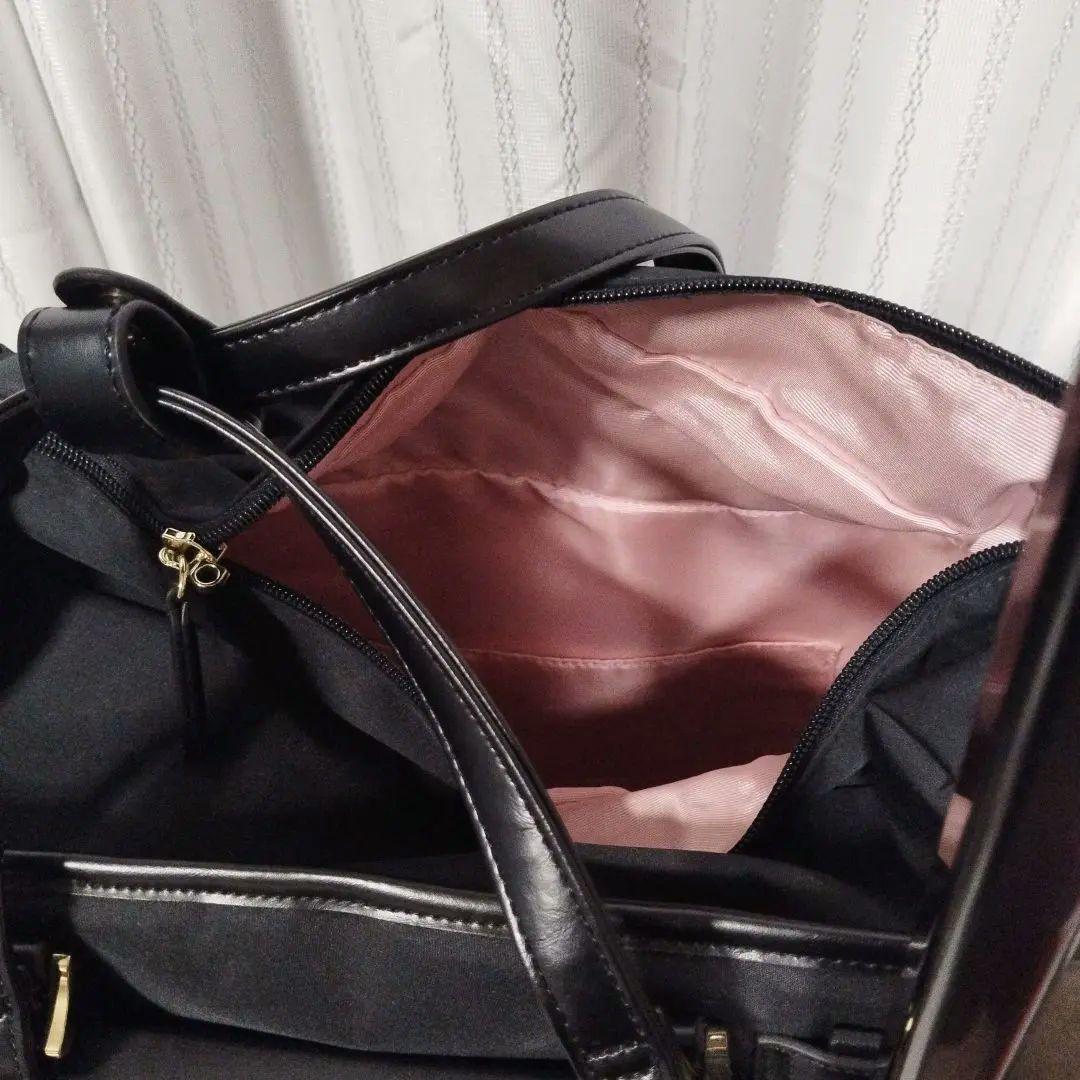 お揃いのポシェットつき！スワニー黒いナイロン製キャリーケース