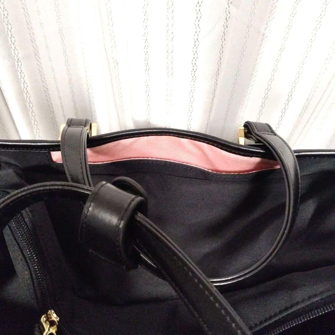 お揃いのポシェットつき！スワニー黒いナイロン製キャリーケース