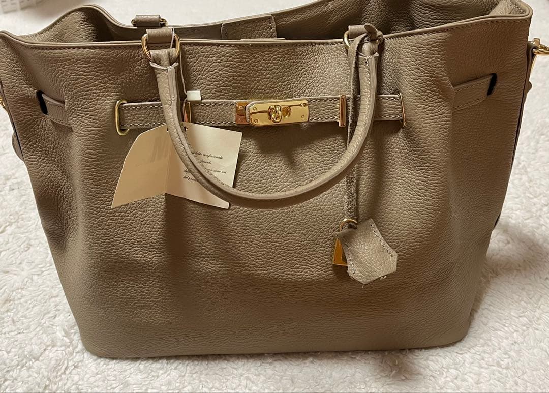 【新品未使用】MILOS ミロス 金具付きトートバック ベージュ NOBLE