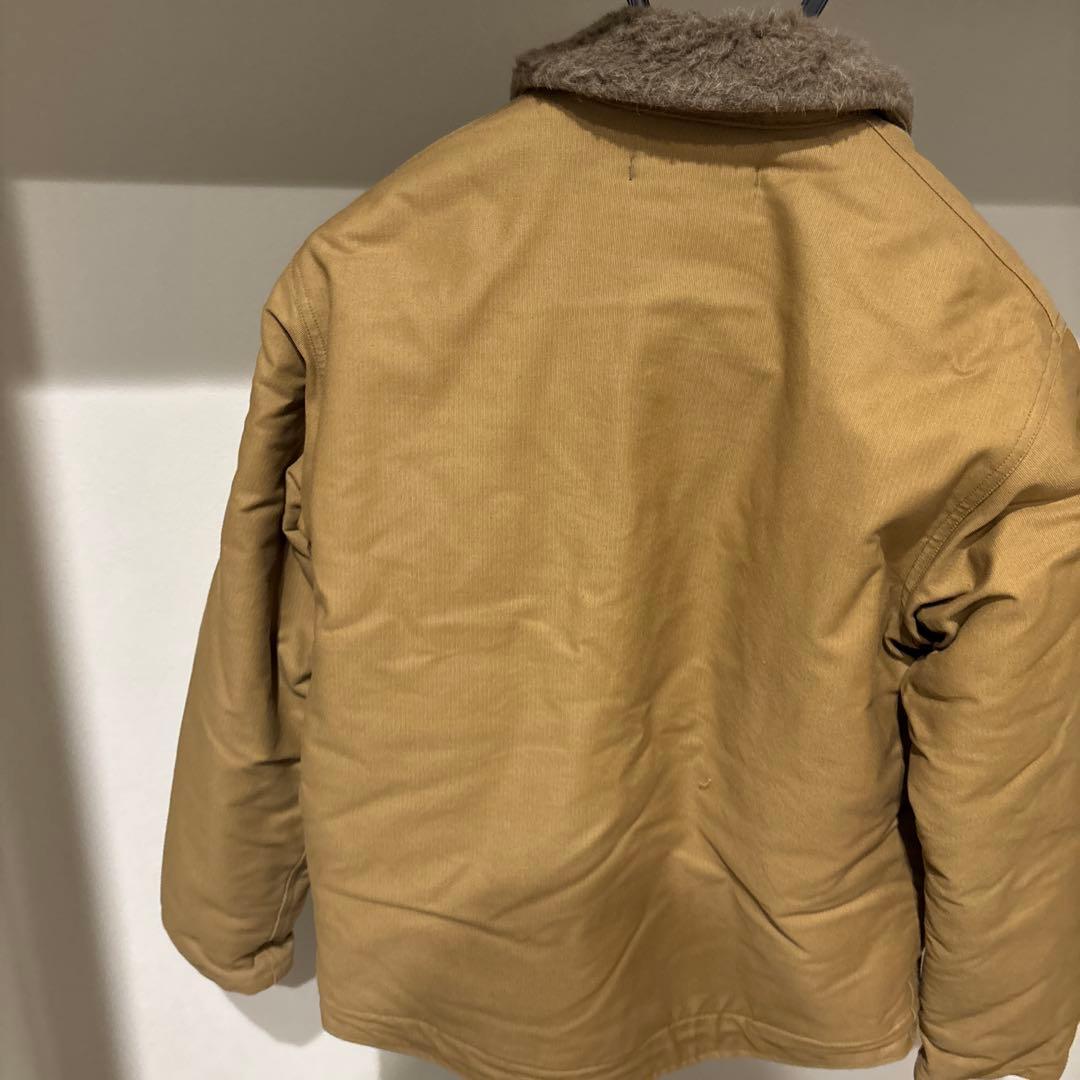 USNロゴ付きベージュミリタリージャケット