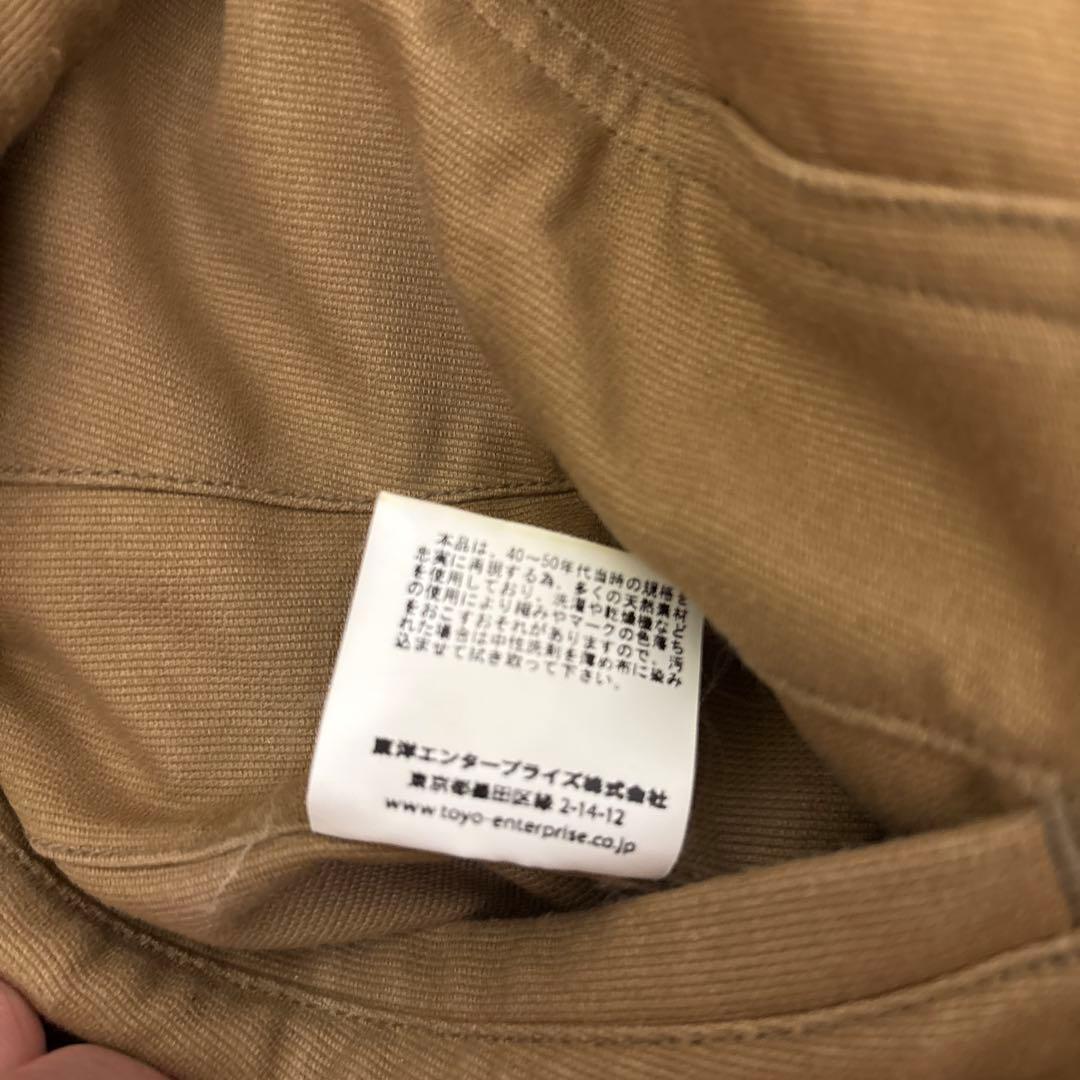 USNロゴ付きベージュミリタリージャケット