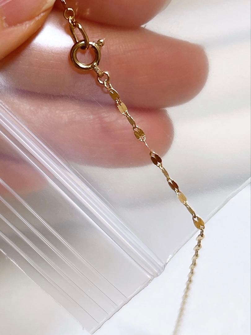 ココシュニック　k18フラワークロスチェーン ロングネックレス