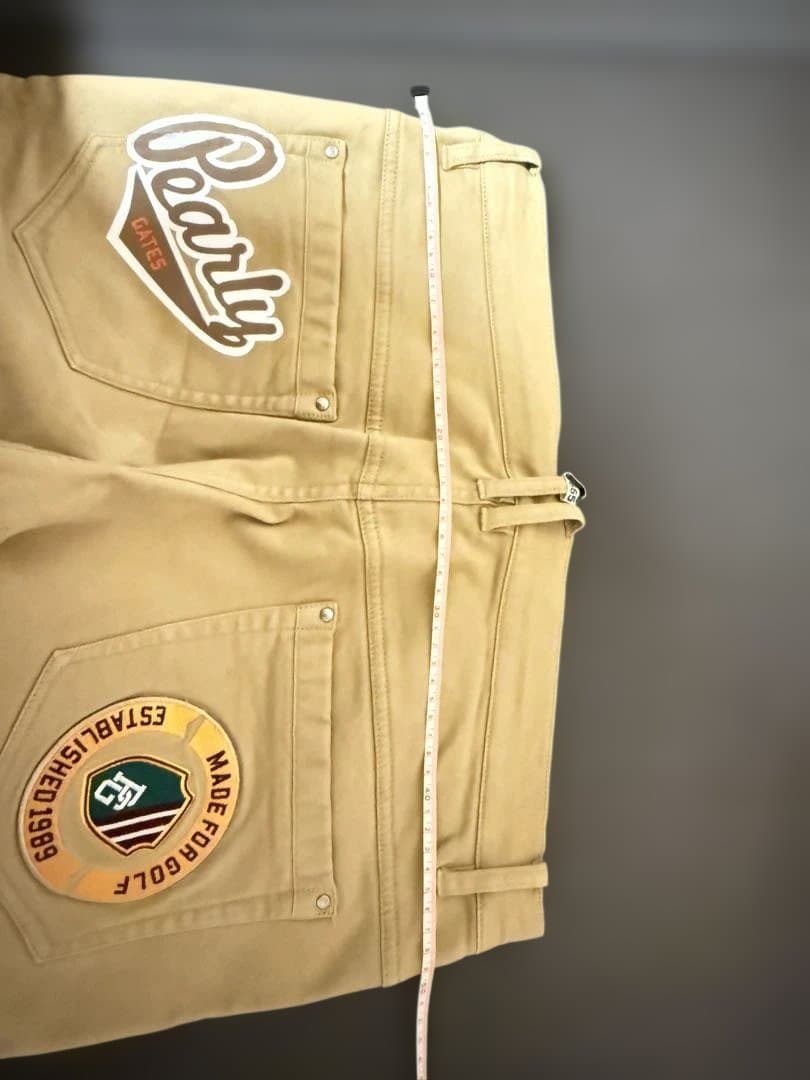 ベージュ パンツ