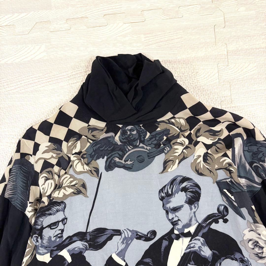 トクコプルミエヴォル✨デザインチュニック　ブラウス　総柄　音楽家　変形　9号