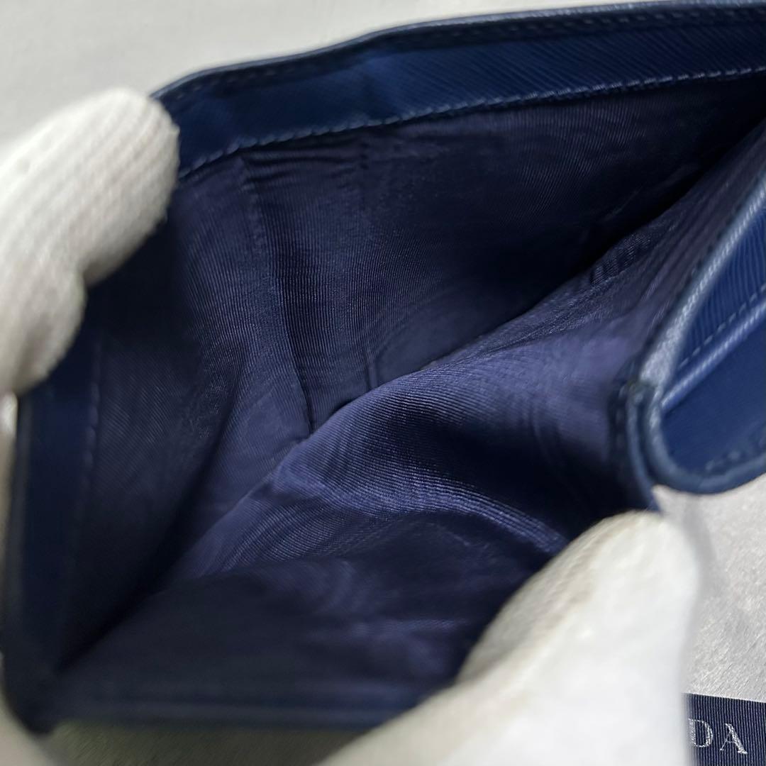 PRADA プラダ　折り財布　ラウンドファスナー　ブルー　ゴールドロゴ