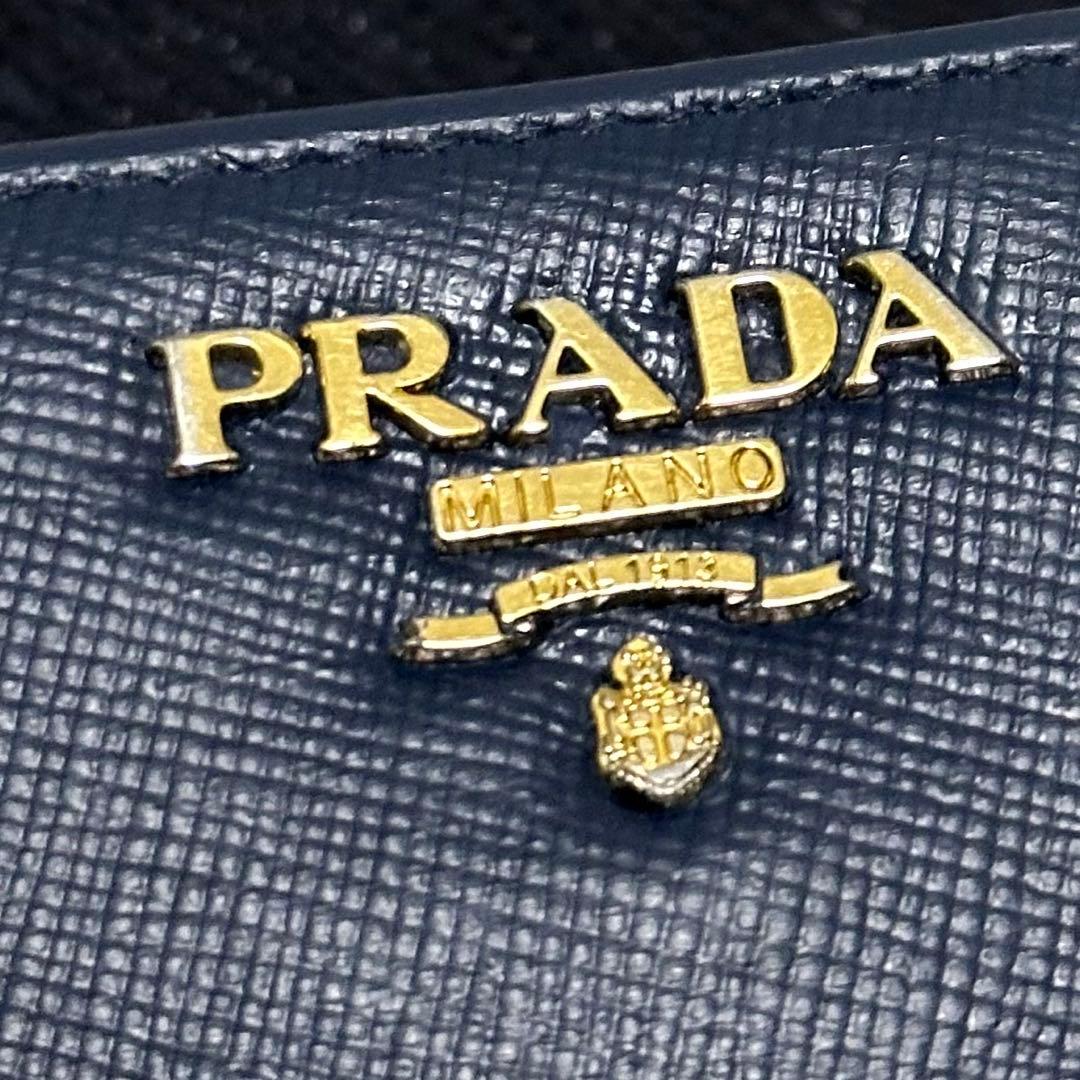 PRADA プラダ　折り財布　ラウンドファスナー　ブルー　ゴールドロゴ